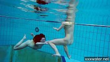 Hot Russian females swimming in a pool.
