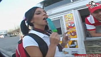 A skinny teen with black hair is seduced by the candyman.