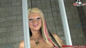 A slender, blonde teen with tiny tits falls in love in a jail cell.