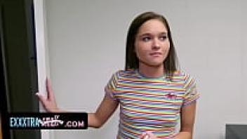 A small, petite brunette enters a football player's dorm room and is reprimanded by his enormous cock.
