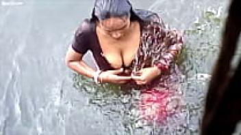 Aunty takes a bath.