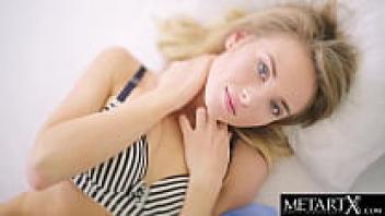A gorgeous nude blonde has a strong orgasm while massaging her shaved pussy.
