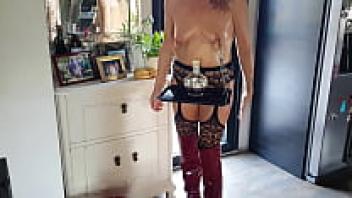 With her nipples pierced and her pussy hot ass boots pierced, this hot mother is lifting a tray.