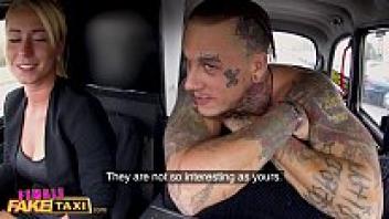 A gorgeous, blonde man with tattoos makes a female fake taxi horny.