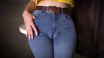 Teasing Her Large Cameltoe in Tight Blue Jeans with a Sexy Milf