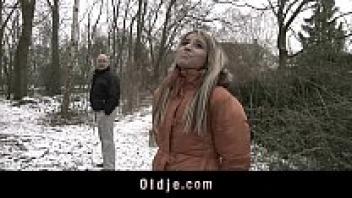 An elderly man who adores a gorgeous blond teenager