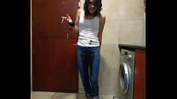 Pissgirl smoking, stripping, and urinating in her jeans